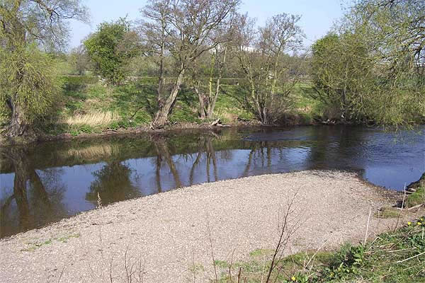 Pebble bank on the River Dee Bangor-on-Dee North Wales